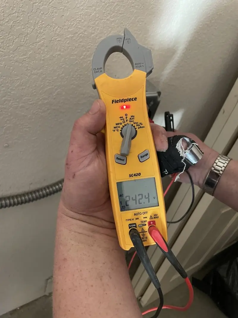 Voltage testing with clamp meter during Circuit Breaker Repair in Cayce